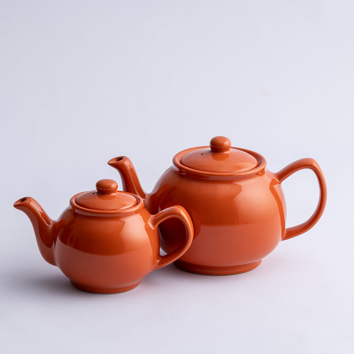 Teekanne, glänzend orange, in 2 Größen